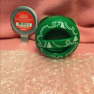 Green car sun visor with 1 twisted peppermint scent Saint refill